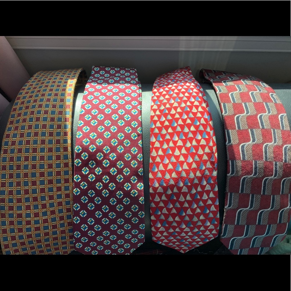 Variety of designer ties, including vintage.